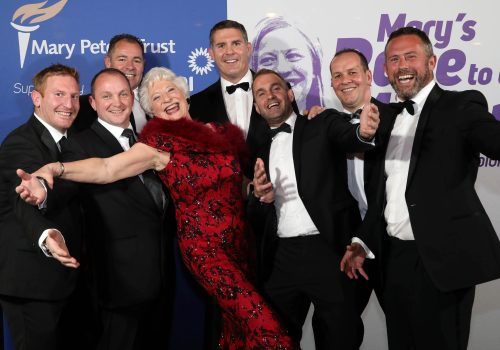 31 May 2019, Mandatory Credit ©Press Eye/Darren Kidd

 Lady Mary celebrates 80 golden years

1999 Heineken Cup Final - Ulster Rugby winning team members (l-r) Andy Ward, Shane Stewart, Sheldon Coulter, Tony McWhirter, Andy Parke, Andrew Matchett and Jan Cunningham with Lady Mary Peters. 

Over 400 sporting guests, Mary Peters Trust supporters and local businesses including event sponsor Power NI, gathered at Titanic Belfast tonight (Friday 31st May) to mark the 80th Birthday of Lady Mary Peters and her contribution to the sporting and community life of Northern Ireland. The gala black-tie dinner also raised funds for ‘Mary’s Race to a Million’ campaign
