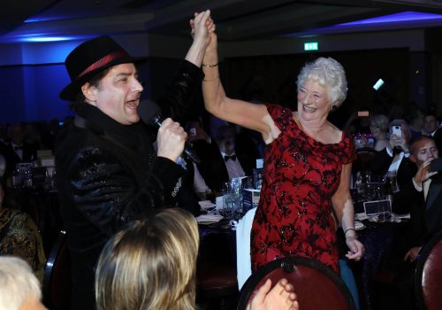 31 May 2019, Mandatory Credit ©Press Eye/Darren Kidd

Belfast songwriter and singer Brian Kennedy during his special rendition of ‘Love, Life, Happiness’ with Lady Mary Peters. 

 Lady Mary celebrates 80 golden years
Over 400 sporting guests, Mary Peters Trust supporters and local businesses including event sponsor Power NI, gathered at Titanic Belfast tonight (Friday 31st May) to mark the 80th Birthday of Lady Mary Peters and her contribution to the sporting and community life of Northern Ireland. The gala black-tie dinner also raised funds for ‘Mary’s Race to a Million’ campaign