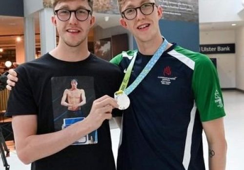 Pic of both with medal